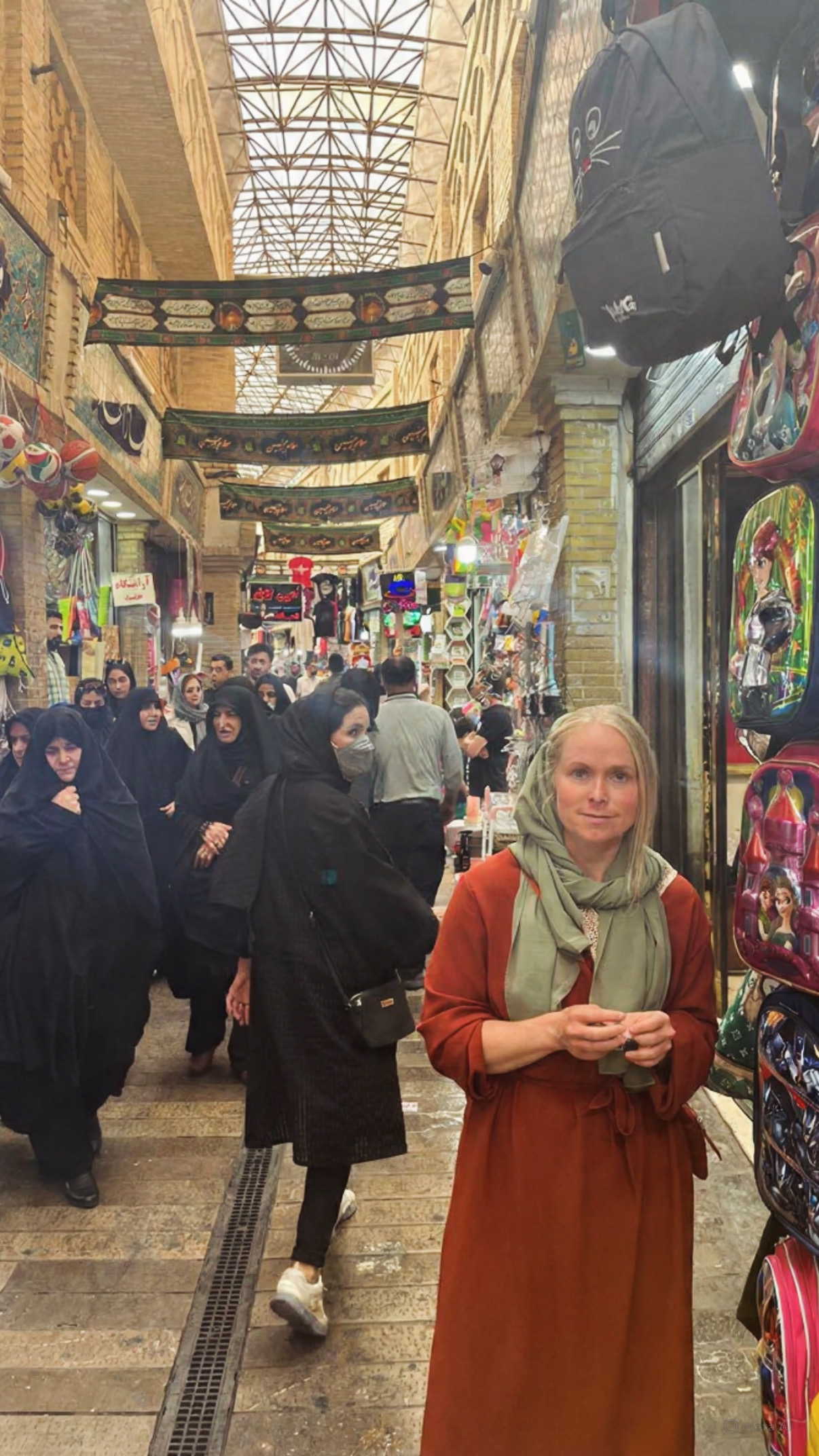 Olivia in a busy bazaar in Iran